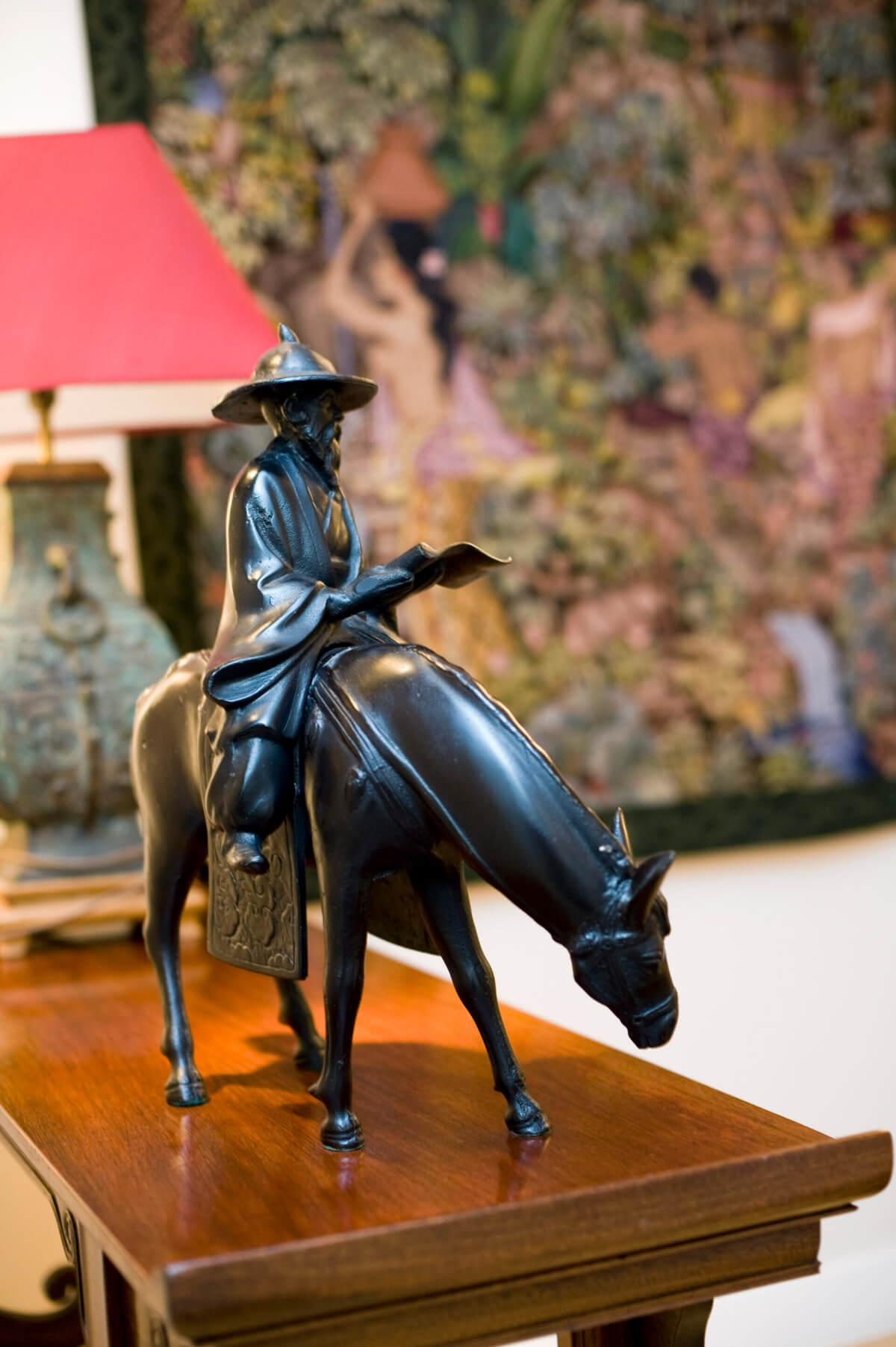 A Man Sitting on a Horse Small Size Black Statue